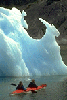 seakayaking by large iceberg