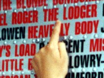 Pointing at Roger the Lodger's name