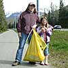 Mary Fitterer and her granddaughter Dani pick up litter along Loop Road.