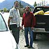 Peter Froehlich helps Russ Kegler from Perseverance Glass load up trash picked up along Jordan Creek.