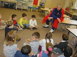 Captain Clean visits with Juneau School children