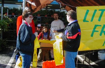 Volunteers at Super Bear supermarket bag station, this past cleanup, May 12, 2001