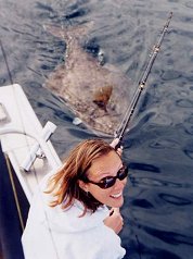 Sept. 4, 2003, We always support catch and release. Amber released this 120+ pound halibut she hooked on light tackle.