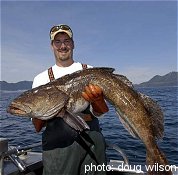 August 23, 2003, Capt. Steve poses with this beautiful 45 pound lingcod.
