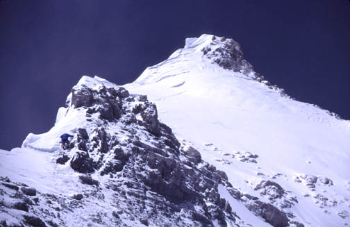 The third step (8,700 meters). Here we caught up to Joao Garcia and Pascal
Debrouwier. You can see Pascal in the blue jacket at the base of the step.