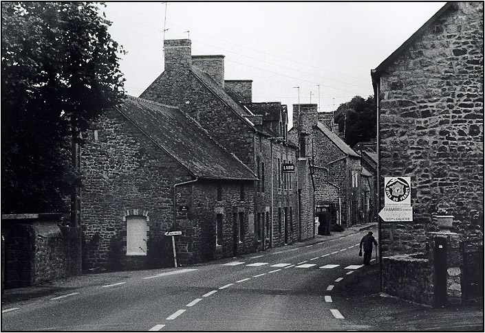 Man on Street in Normandy, France