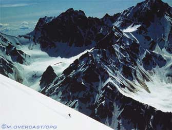 skier with huge mountains
