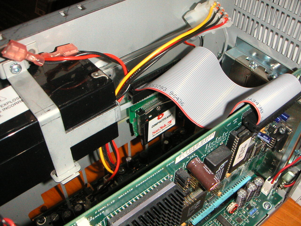 Inside an InterJet: the internal UPS battery and a CompactFlash adapter.