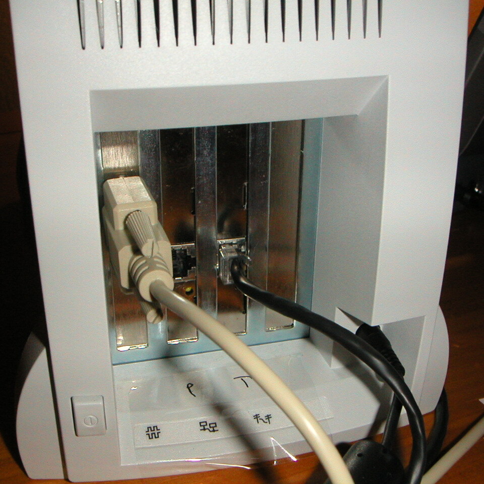 The InterJet rear, its card slots with cables fitted.