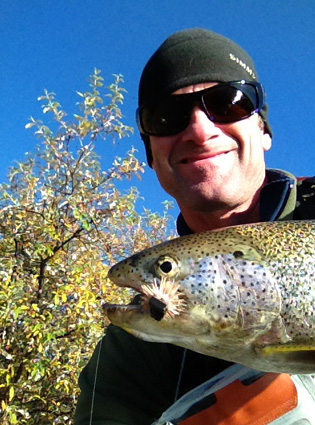 John catches Rainbow on Deer Hair Mouse