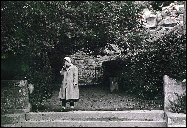 Lady on Path, Mont St. Michel, France