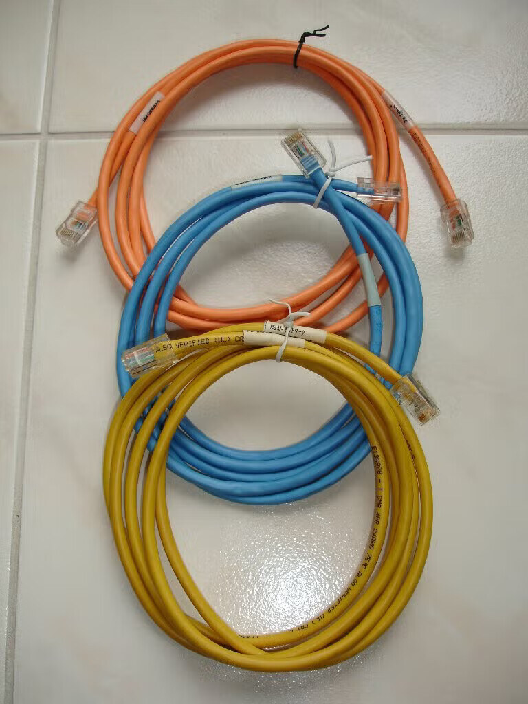 The three cables in the box: orange crossover, blue Office Network, yellow Perimeter Network.