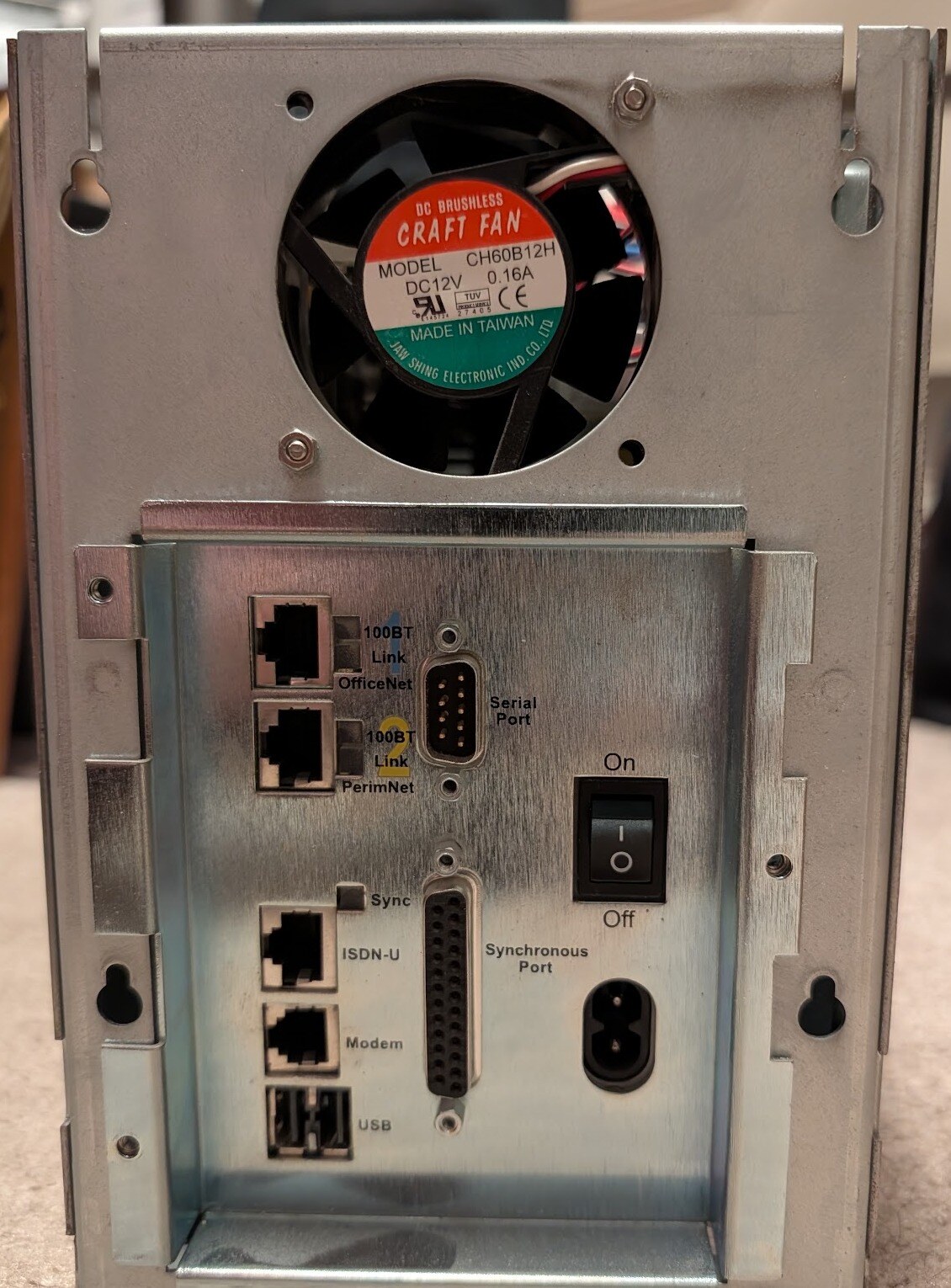 The InterJet II rear with its cover off: OfficeNet and PerimNet 100BT, Serial Port, Sync, ISDN-U, Modem, USB, Synchronous Port.