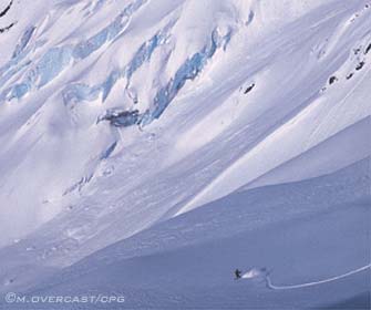 snowboarder with glacial view