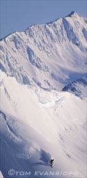 snowboarder with byron headwall